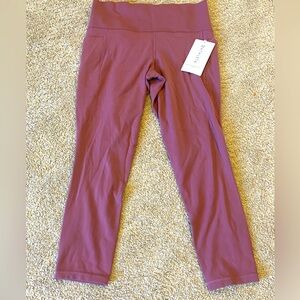 ATHLETA SALUTATION STASH POCKET II 7/8 TIGHT LEGGINGS